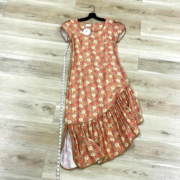 LeiKinis Dresses & Skirts - NWT LeiKinis Hawaiian Authentic dress. puakenikeni